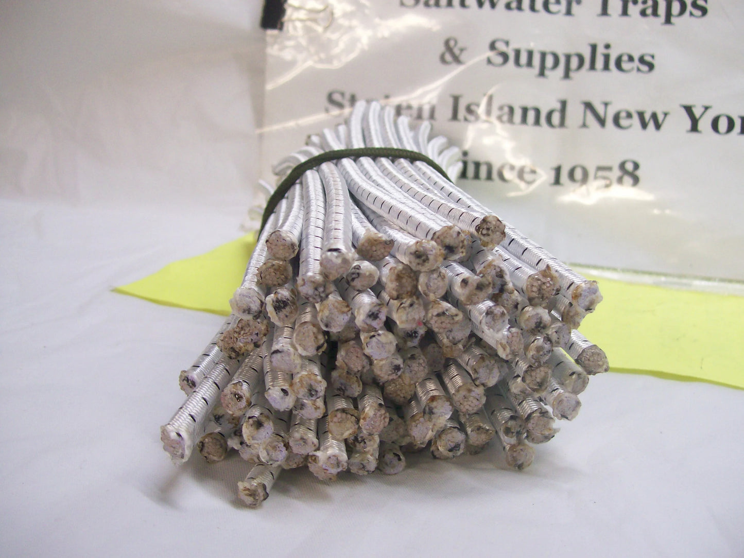E-Z Catch 100 count Bungee shock cord Size 7/32" x 7 inch cuts White w/Black USA