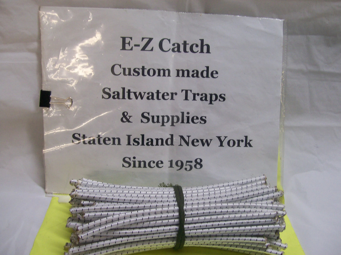 E-Z Catch 100 count Bungee shock cord Size 7/32" x 7 inch cuts White w/Black USA
