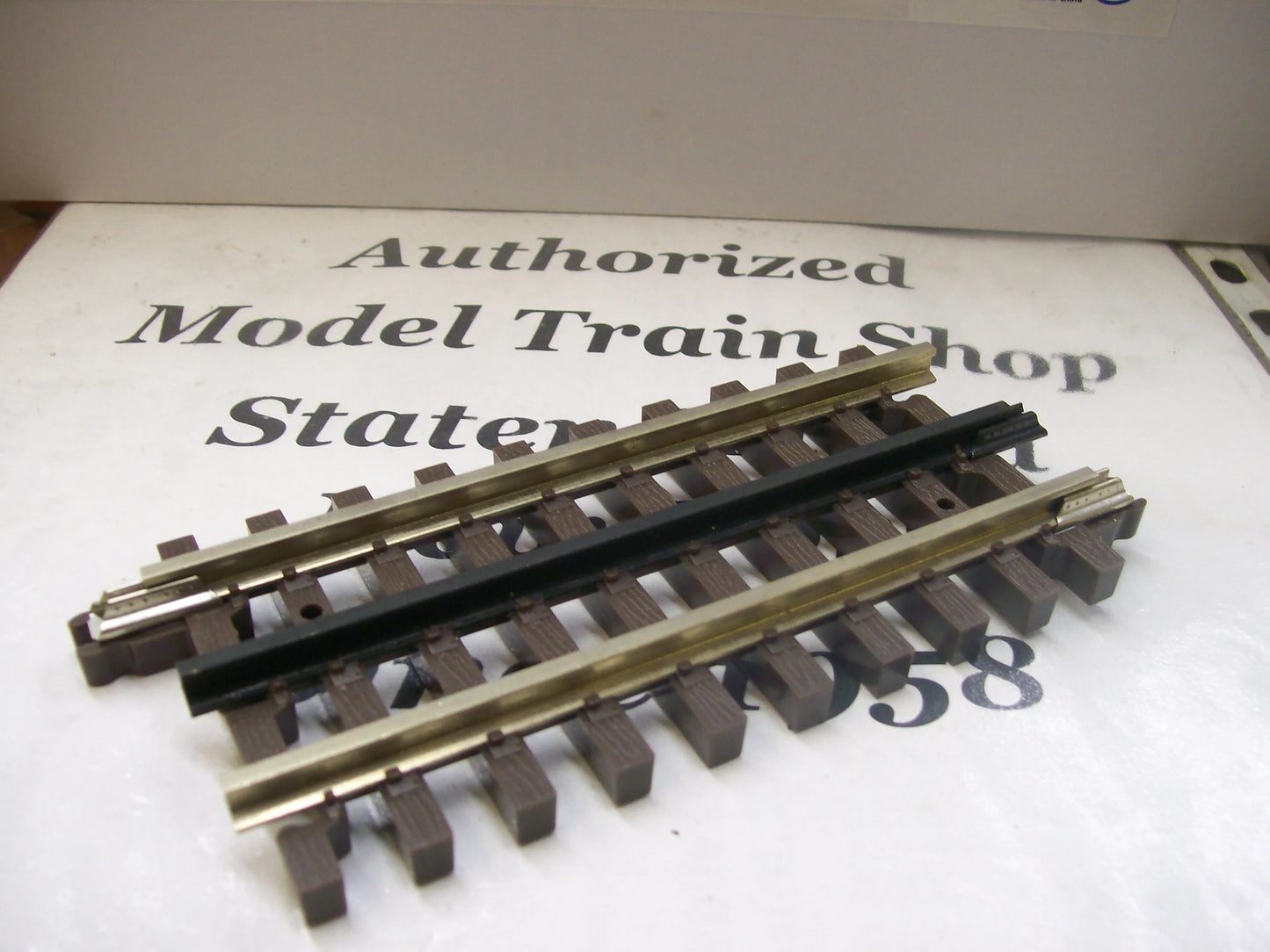 Atlas O Gauge # 6051 ( 4-1/2") Straight Track O Scale Nickel Silver ( Sold Each )