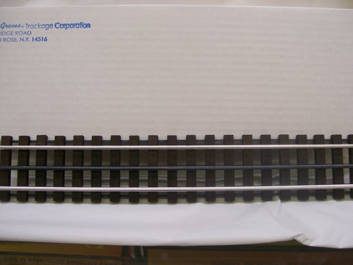 Gar Graves # WT-101-12 ( O Gauge) Rigid Phantom Tinplate ( 12-Pack ) 12.4" Straight Track w/ Wood Ties